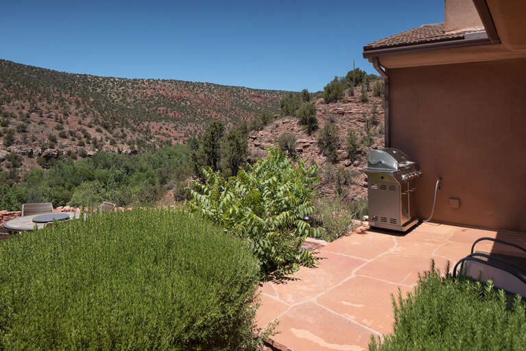 Surrounded by vibrant plants and natural vegetation, this tranquil space is perfect for relaxing or Surrounded by vibrant plants and natural vegetation, this tranquil space is perfect for relaxing or