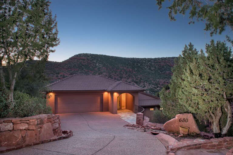 This home was thoughtfully designed to showcase panoramic views of Sedona's breathtaking red rock hills, immersing you in the natural beauty of the area This home was thoughtfully designed to showcase panoramic views of Sedona's breathtaking red rock hills, immersing you in the natural beauty of the area