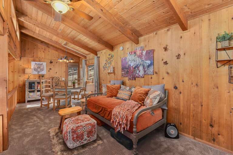 This versatile space off the Family Room includes a comfortable daybed and a futon, making it perfect for lounging, reading, or even an afternoon nap. This versatile space off the Family Room includes a comfortable daybed and a futon, making it perfect for lounging, reading, or even an afternoon nap.