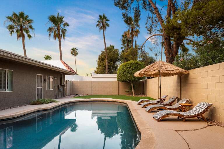 Pool Area w/ Sun Beds Pool Area w/ Sun Beds