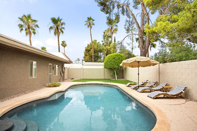 Pool Area w/ Sun Beds Pool Area w/ Sun Beds