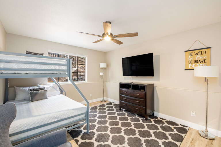 Bunk Room 4: Twin-over-Double Bunk Bed with smart TV, perfect for kids or additional guests. Bunk Room 4: Twin-over-Double Bunk Bed with smart TV, perfect for kids or additional guests.