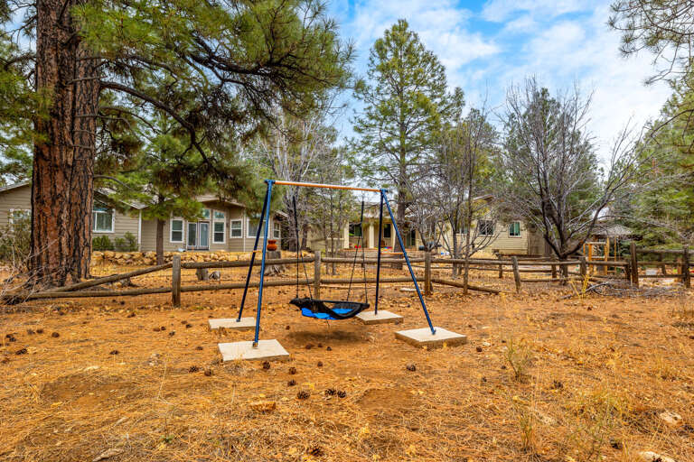 For kids or those young at heart there is even a swing in the yard! For kids or those young at heart there is even a swing in the yard!
