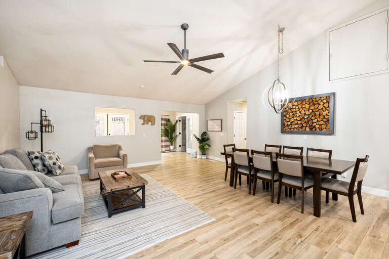 Open-concept layout seamlesly flows to the dining and kitchen area. Open-concept layout seamlesly flows to the dining and kitchen area.