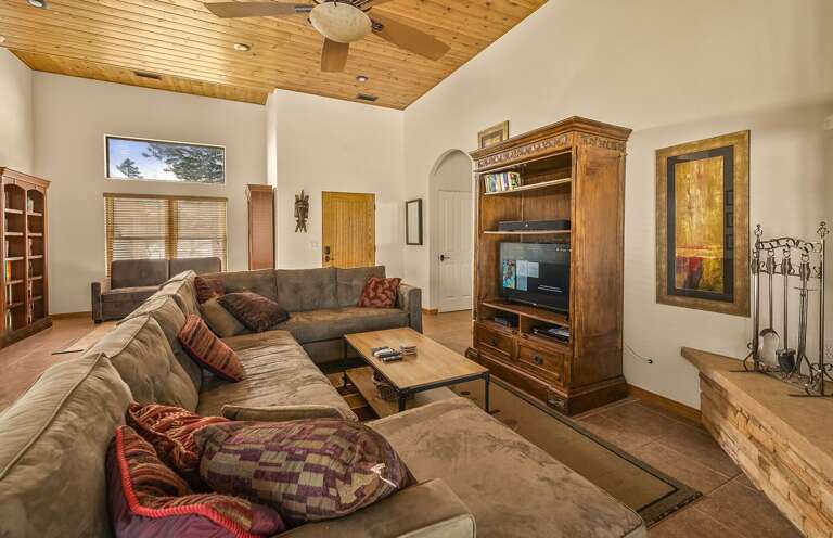 Large living room couch and TV for your enjoyment