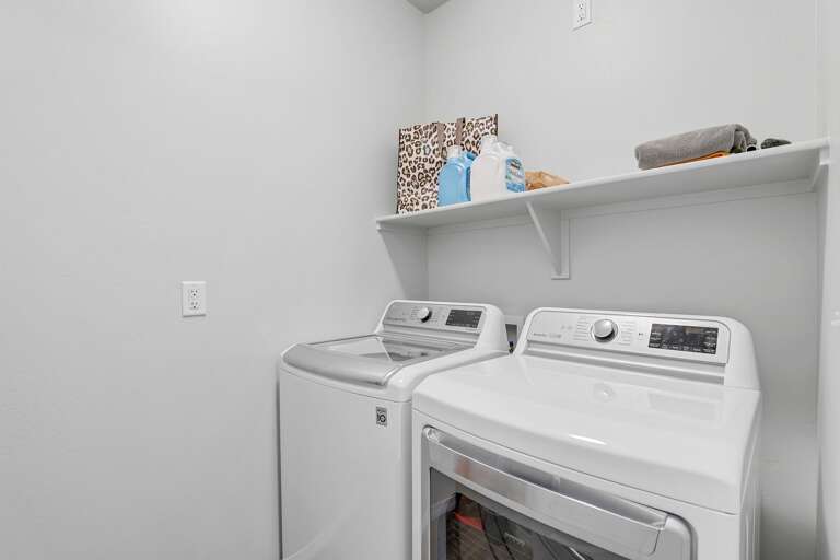 Spacious laundry room for your convenience.