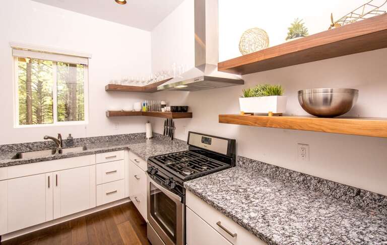 Fully Equipped Chef's Kitchen: Granite countertops, stainless steel appliances, and all the tools needed to prepare and enjoy incredible home-cooked meals. Fully Equipped Chef's Kitchen: Granite countertops, stainless steel appliances, and all the tools needed to prepare and enjoy incredible home-cooked meals.