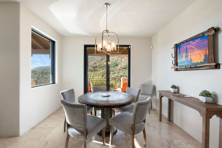 Additional dining set for four with balcony access. Additional dining set for four with balcony access.