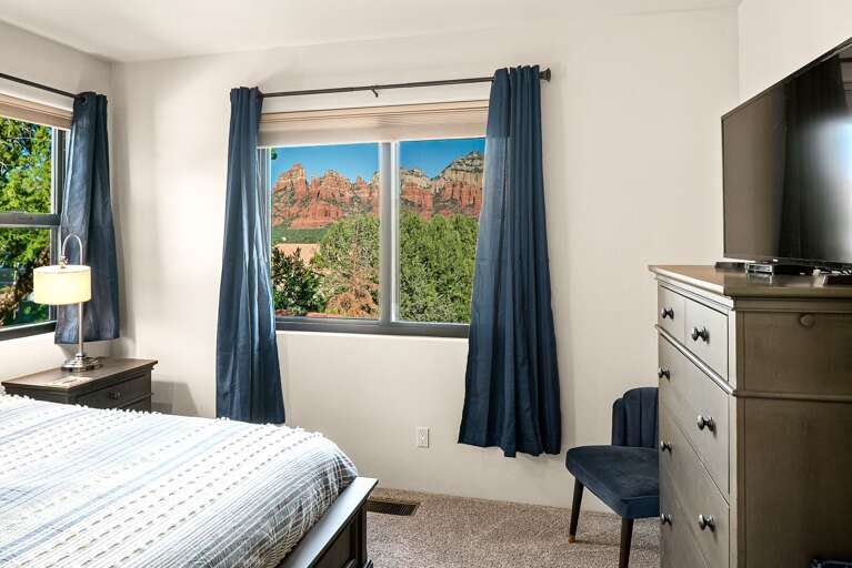 Bedroom 2 (Second Master en-suite): 
King bed with Vews, TV, and a private bathroom that includes a shower, toilet, and single sink. Bedroom 2 (Second Master en-suite): 
King bed with Vews, TV, and a private bathroom that includes a shower, toilet, and single sink.