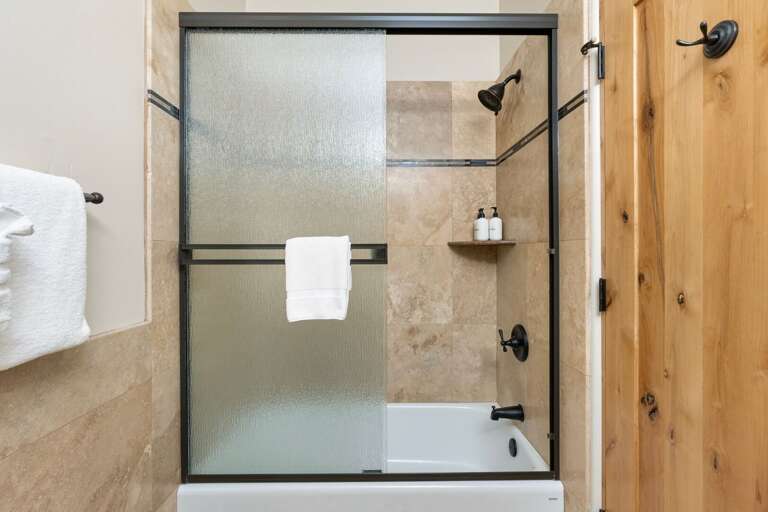 Bedroom 2 (Second Master en-suite): 
King bed with Vews, TV, and a private bathroom that includes a tub/shower combo, toilet, and Bedroom 2 (Second Master en-suite): 
King bed with Vews, TV, and a private bathroom that includes a tub/shower combo, toilet, and