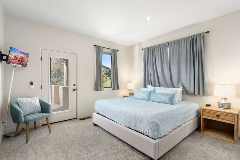 Bedroom 3: 
King bed with access to the back deck. Shares a hallway bathroom with Bedroom 4. Bedroom 3: 
King bed with access to the back deck. Shares a hallway bathroom with Bedroom 4.