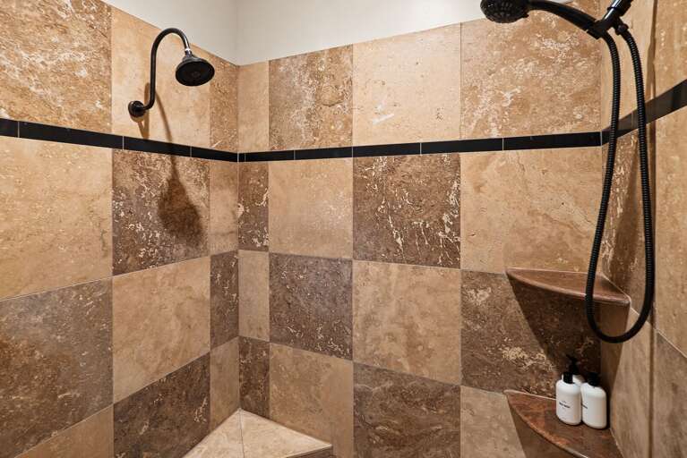 Master En-suite features a luxurious bathroom with a walk-in two-person shower, jacuzzi tub with stunning views, and double sinks. Master En-suite features a luxurious bathroom with a walk-in two-person shower, jacuzzi tub with stunning views, and double sinks.