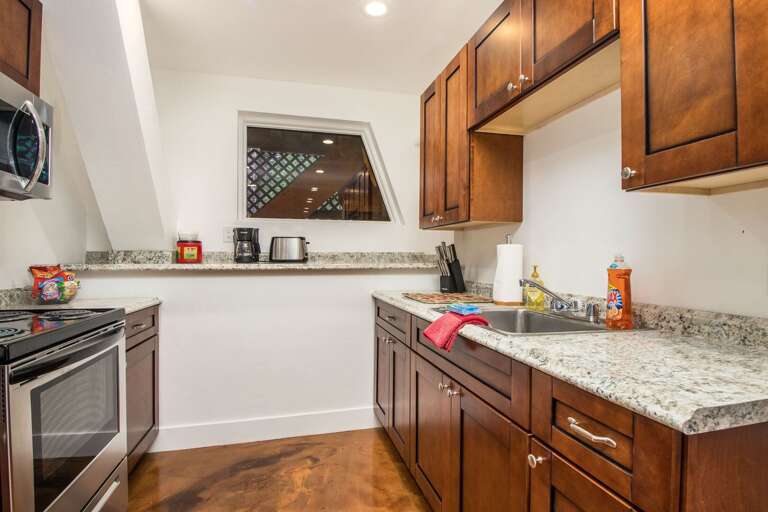 Kitchen is equipped with a coffee maker and a 2-slice toaster.