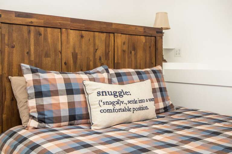 Rustic Meets Modern – Enjoy epoxy floors, dark wood accents, cozy gas fireplace and comfortable furnishings.