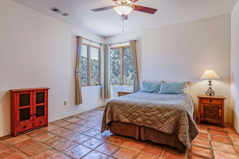 Bedroom 2: Queen Bed, views and with en-suite bathroom (shower and toilet).