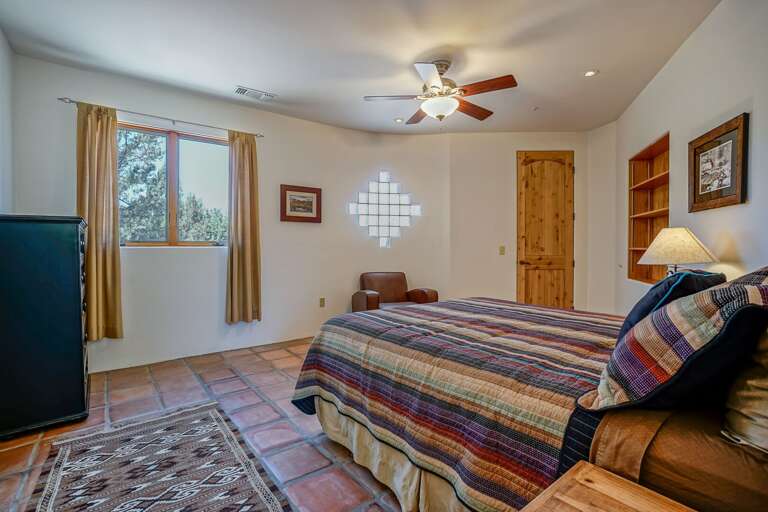 Bedroom 3: Queen Bed, views and en-suite bathroom (shower/tub combo and toilet).