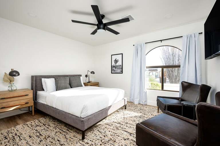 Bedroom with beautiful winged chairs. Bedroom with beautiful winged chairs.