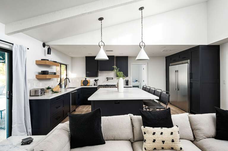 Large kitchen island for preparing and dining. Large kitchen island for preparing and dining.