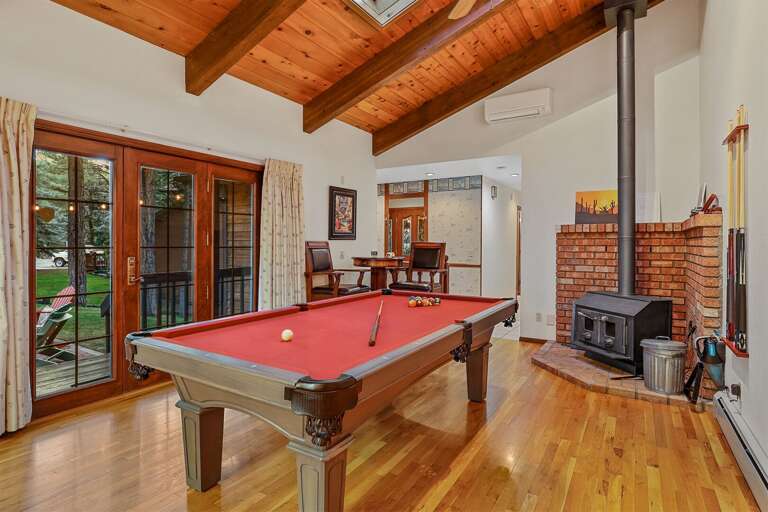 Endless Entertainment: Features a red-felt pool table, a convertible poker/dining table, a 60-in-1 arcade game, and fun board games. Endless Entertainment: Features a red-felt pool table, a convertible poker/dining table, a 60-in-1 arcade game, and fun board games.