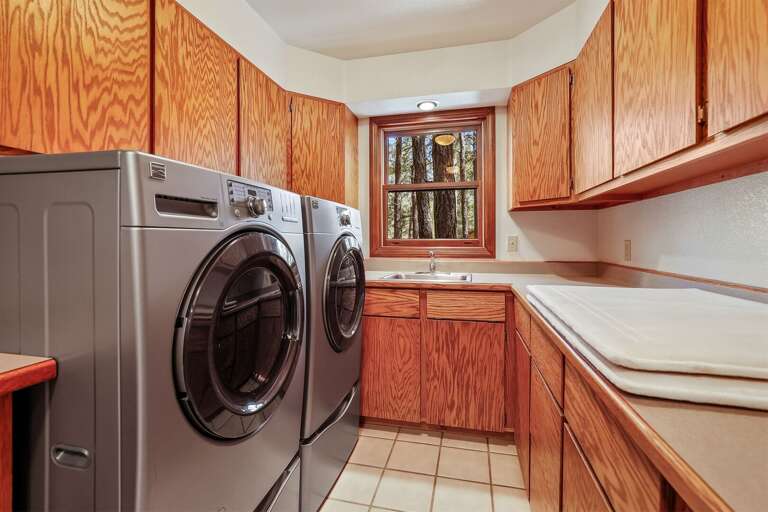 Laundry: A laundry room with a full-size washer and dryer. Laundry: A laundry room with a full-size washer and dryer.