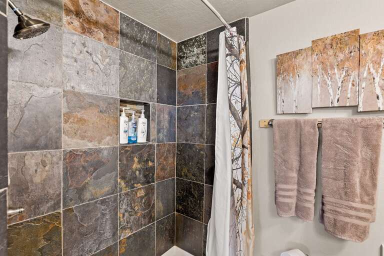 1st Floor - Master Bedroom 1: King Bed, private bathroom, a balcony with stunning mountain views, electric fireplace and a dedicated workspace. 1st Floor - Master Bedroom 1: King Bed, private bathroom, a balcony with stunning mountain views, electric fireplace and a dedicated workspace.