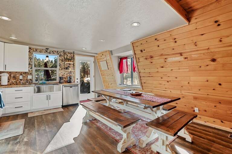 Dining area with seating for 8, plus outdoor dining on the oversized deck Dining area with seating for 8, plus outdoor dining on the oversized deck