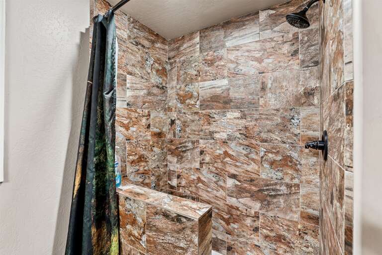 Downstairs -  Master Bedroom 2 - 2 Queen Beds, Ensuite bathroom, electric fireplace and large smart tv and plenty of space to unwind Downstairs -  Master Bedroom 2 - 2 Queen Beds, Ensuite bathroom, electric fireplace and large smart tv and plenty of space to unwind