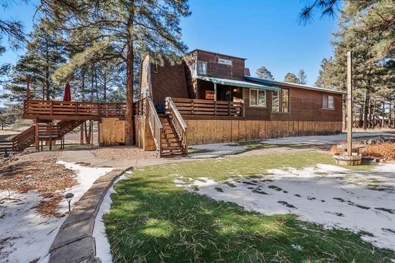 Lawn Games & Fire Pit: Have fun with activities like corn hole, giant Jenga, and ladder toss, or gather around the malapais rock gas fire pit for cozy evenings Lawn Games & Fire Pit: Have fun with activities like corn hole, giant Jenga, and ladder toss, or gather around the malapais rock gas fire pit for cozy evenings