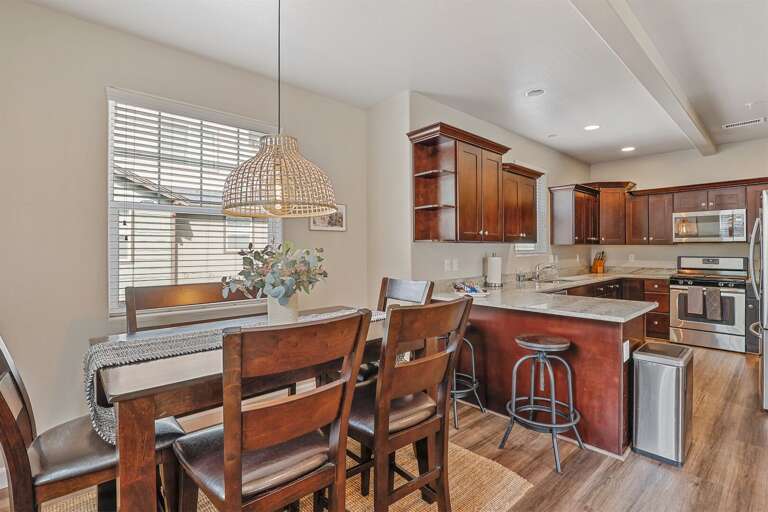 Dining table for 6 + 2 seats at the kitchen bar Dining table for 6 + 2 seats at the kitchen bar