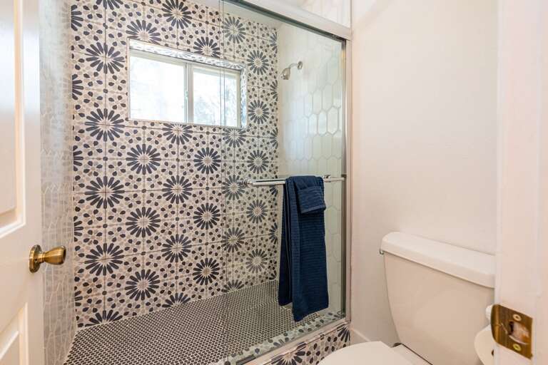 a beautiful tiled walk-in shower a beautiful tiled walk-in shower