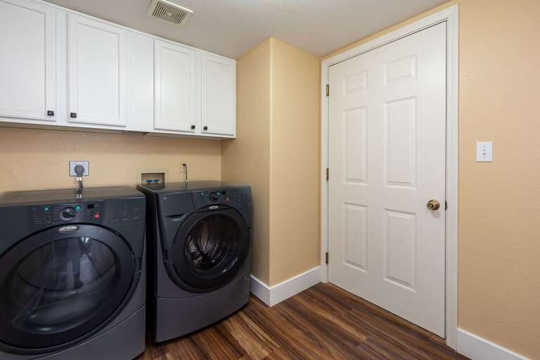 Laundry room with full size washer and dryer on the first floor Laundry room with full size washer and dryer on the first floor