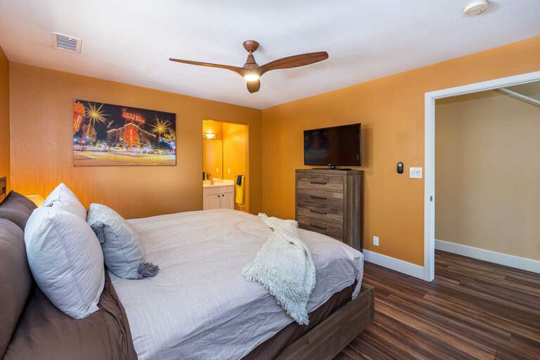 Master Suite – King bed, spacious closet, and en suite bathroom with dual vanities and a tiled walk-in shower. Master Suite – King bed, spacious closet, and en suite bathroom with dual vanities and a tiled walk-in shower.
