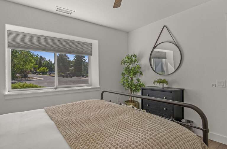 1st Bedroom: Queen bed, cozy tufted seating bench, and 2 end tables. 1st Bedroom: Queen bed, cozy tufted seating bench, and 2 end tables.