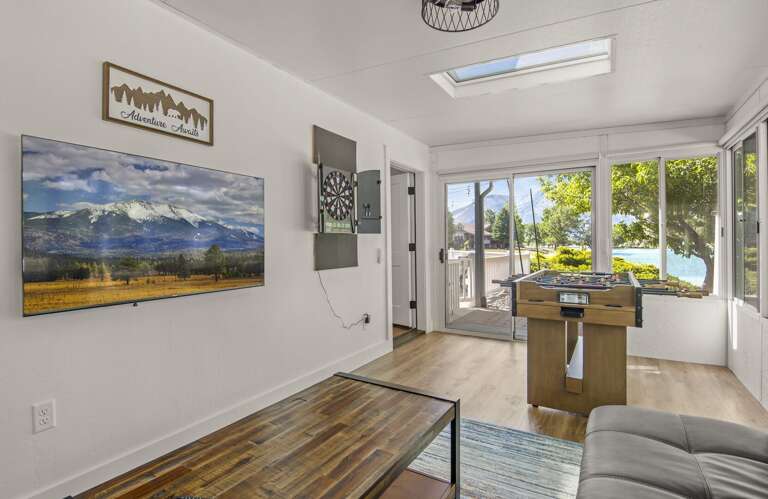 a flat screen wall mounted TV a flat screen wall mounted TV