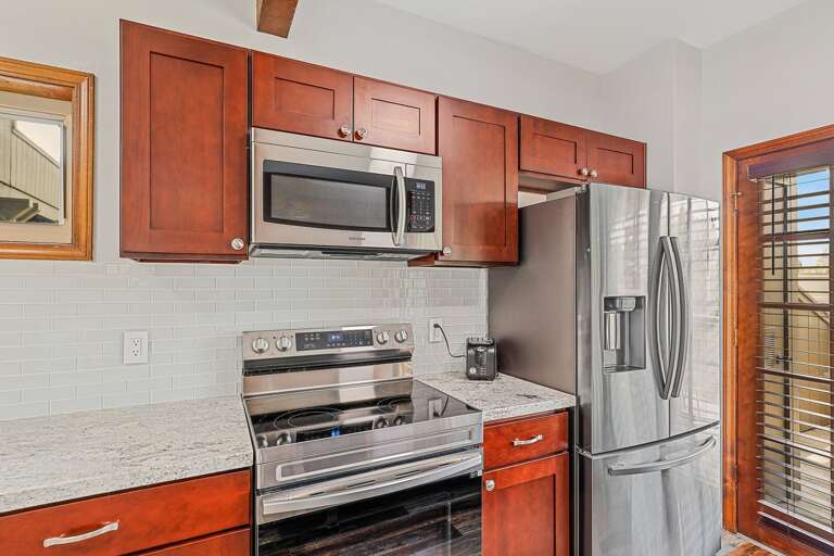 New appliances, including a coffee maker and electric kettle. New appliances, including a coffee maker and electric kettle.