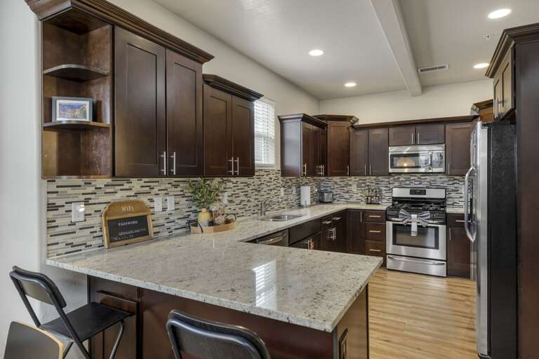 Fully Equipped Kitchen: New stainless steel appliances, granite countertops, and all the essentials Fully Equipped Kitchen: New stainless steel appliances, granite countertops, and all the essentials
