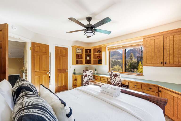 Bedroom 3 – Queen bed with cozy touches and dedicated workspace for 2 with sweeping views. Bedroom 3 – Queen bed with cozy touches and dedicated workspace for 2 with sweeping views.