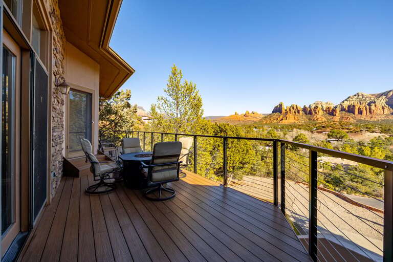 The hot tub, fire pit, and seating area set against Sedona's iconic red rocks create the ultimate environment for unwinding with breathtaking views. The hot tub, fire pit, and seating area set against Sedona's iconic red rocks create the ultimate environment for unwinding with breathtaking views.