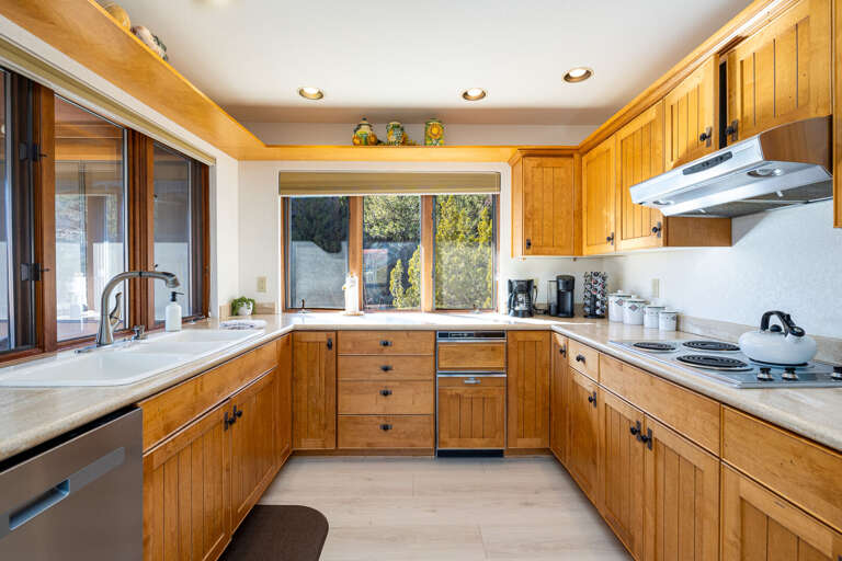 The kitchen is fully stocked for all your culinary needs with top-of-the-line appliances, utensils, and plenty of counter space to prepare anything from brunch to late-night snacks. The kitchen is fully stocked for all your culinary needs with top-of-the-line appliances, utensils, and plenty of counter space to prepare anything from brunch to late-night snacks.