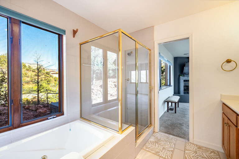 Master Bathroom – Features double vanity, soaking tub, and walk-in shower. Master Bathroom – Features double vanity, soaking tub, and walk-in shower.