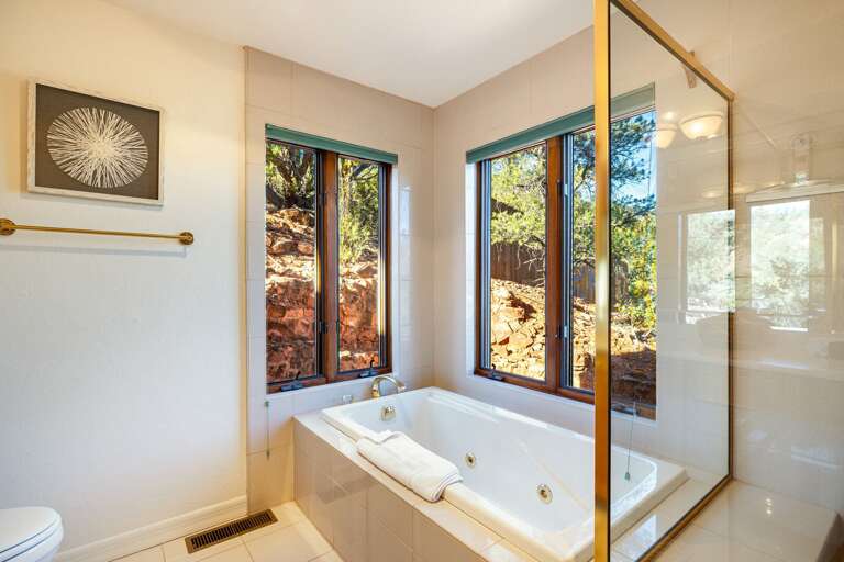 Master Bathroom – Features double vanity, soaking tub, and walk-in shower. Master Bathroom – Features double vanity, soaking tub, and walk-in shower.