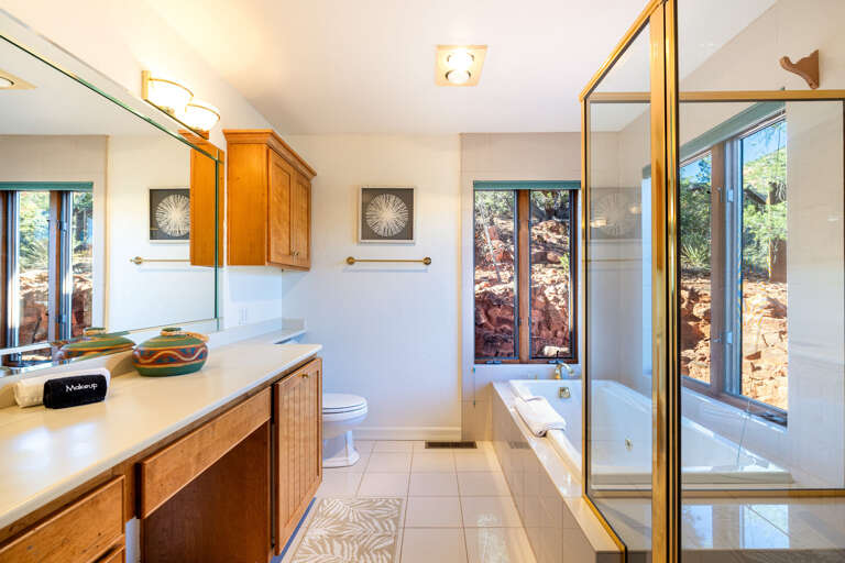 Master Bathroom – Features double vanity, soaking tub, and walk-in shower. Master Bathroom – Features double vanity, soaking tub, and walk-in shower.