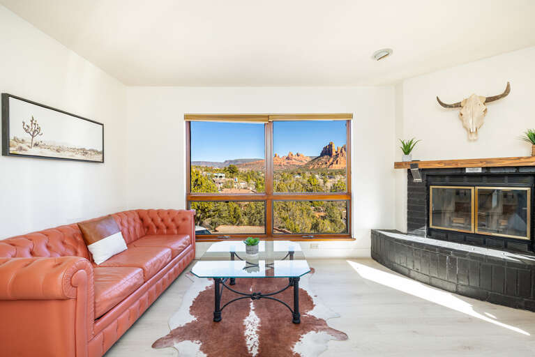 Start your mornings lounging in the spacious, light-filled living room with large windows showcasing spectacular views. Start your mornings lounging in the spacious, light-filled living room with large windows showcasing spectacular views.