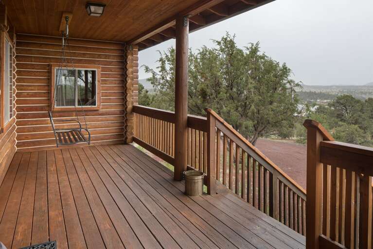 Swing on the front porch with panoramic mountain views Swing on the front porch with panoramic mountain views