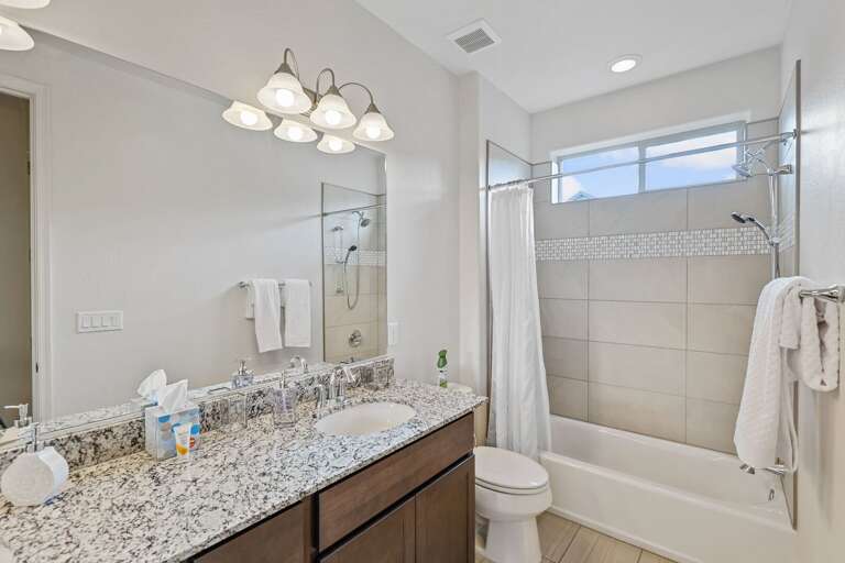 2nd Floor - Shared Full Bathroom: Granite countertops, dual sinks, and a shower/tub combination. 2nd Floor - Shared Full Bathroom: Granite countertops, dual sinks, and a shower/tub combination.