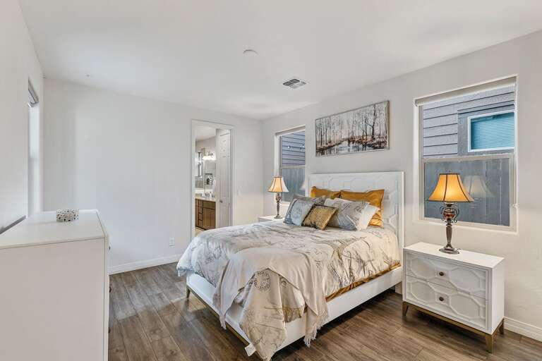 Master Suite: Queen bed, dresser, bedside lamps, walk-in closet, and an en-suite with a walk-in shower. Master Suite: Queen bed, dresser, bedside lamps, walk-in closet, and an en-suite with a walk-in shower.
