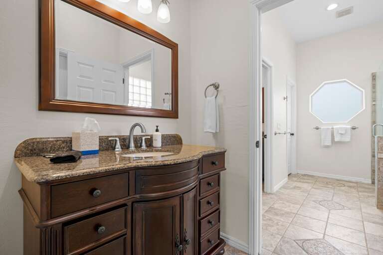 Full Bathroom Shared Between Bedroom Two & Three