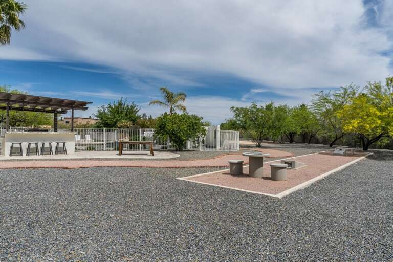 Outdoor cornhole and chess