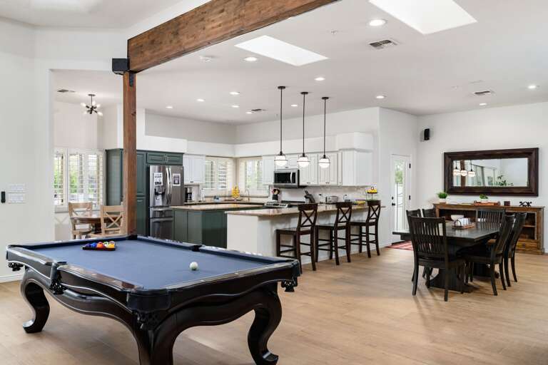Pool Table, Dining Area & Kitchen Off of Living Area
