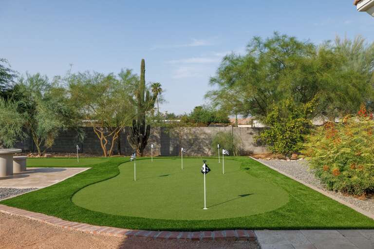 Practice your short game anytime on the private backyard putting green, surrounded by beautiful desert landscaping and Arizona sunshine.
